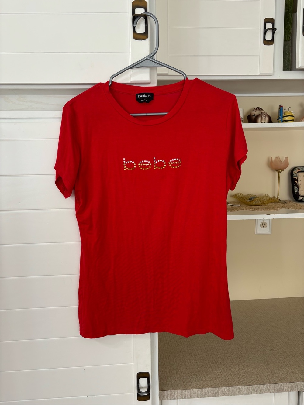 Red T-shirt with rhinestone logo